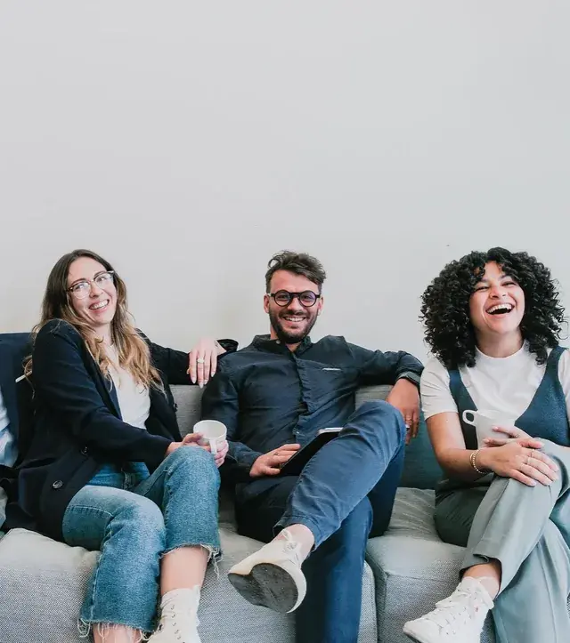 Healthcare marketing team laughing together during a workshop